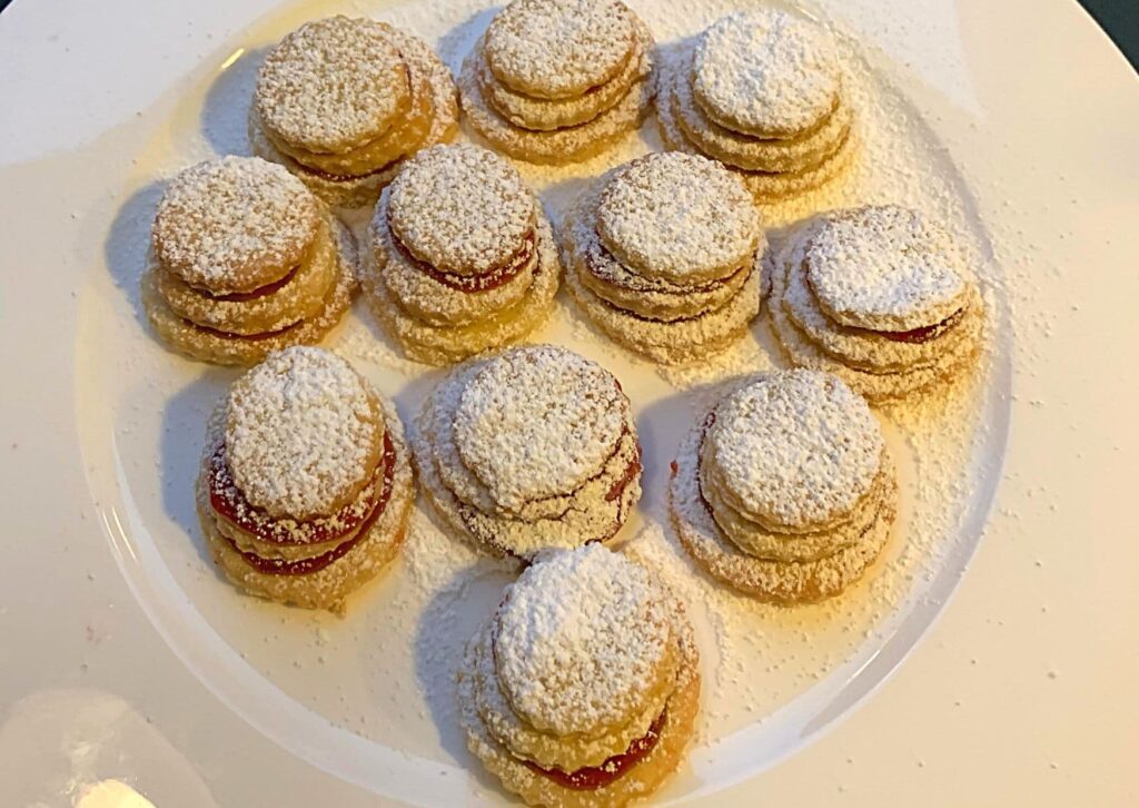German Christmas terraces on a white plate, ready to eat. Photo is taken from above.