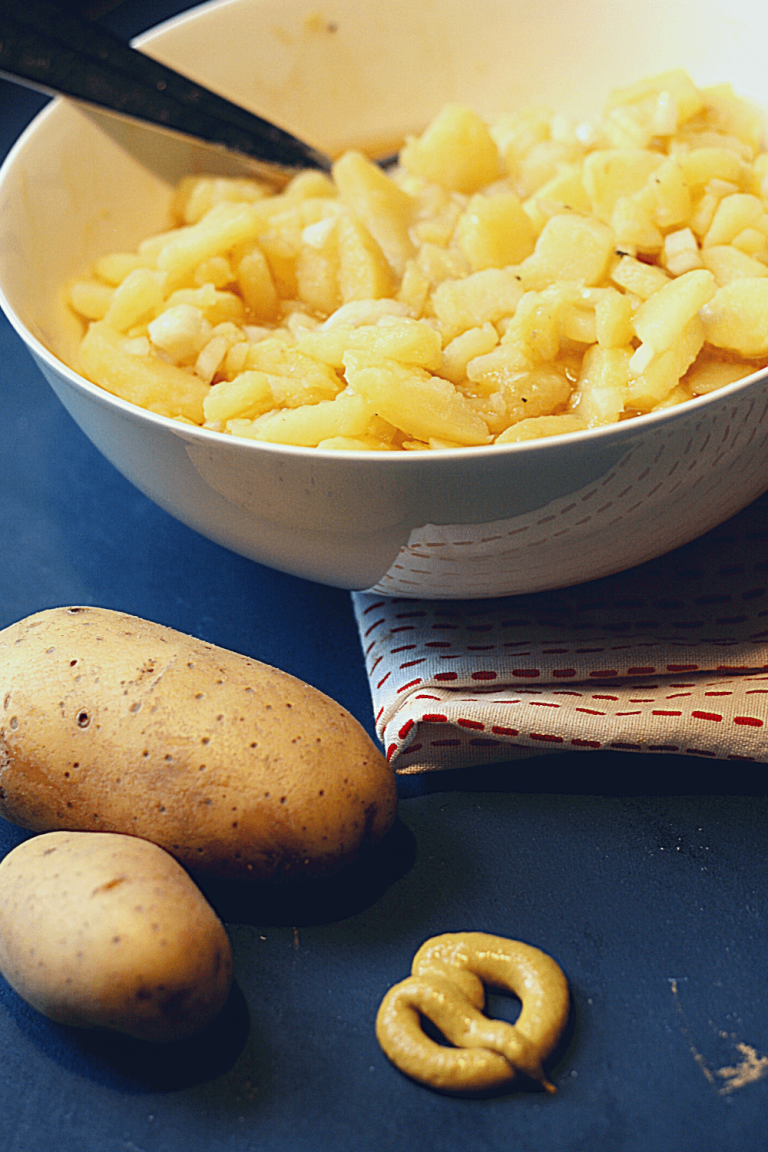 Authentic German-style potato salad, 3 ways. Image of Swabian potato salad with potatoes and mustard