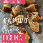 How to make festive pigs in a blanket: Perfect for your Christmas afternoon tea; pin with text and image of pigs in a blanket on a tray