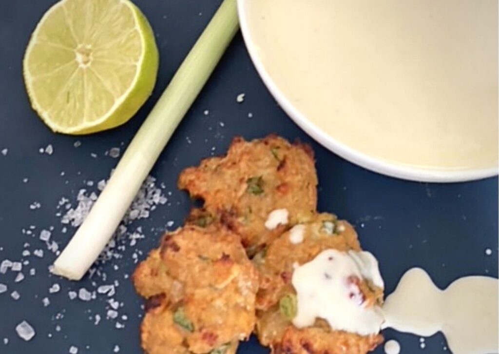 3 simple chicken balls with a bowl of homemade gin mayonnaise, some rock salt, a spring onion and half a lime