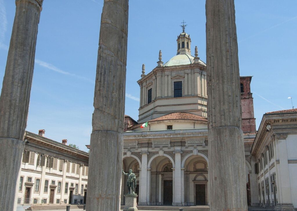 The Colonne di San Lorenzo with San Sepulcro church in the background. These are some of the best Roman ruins you can find in Milan.